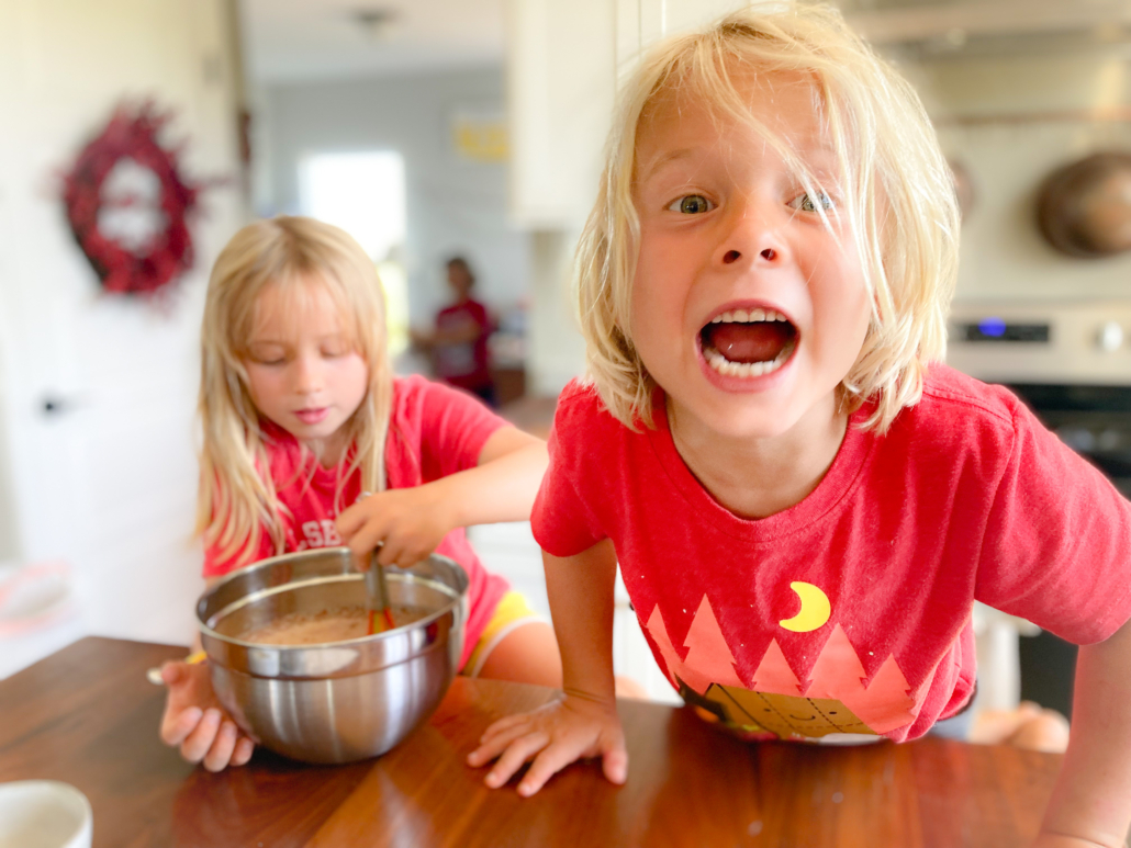 Wild kids mixing ice cream batter